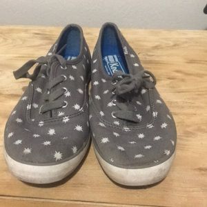 Grey and white keds
